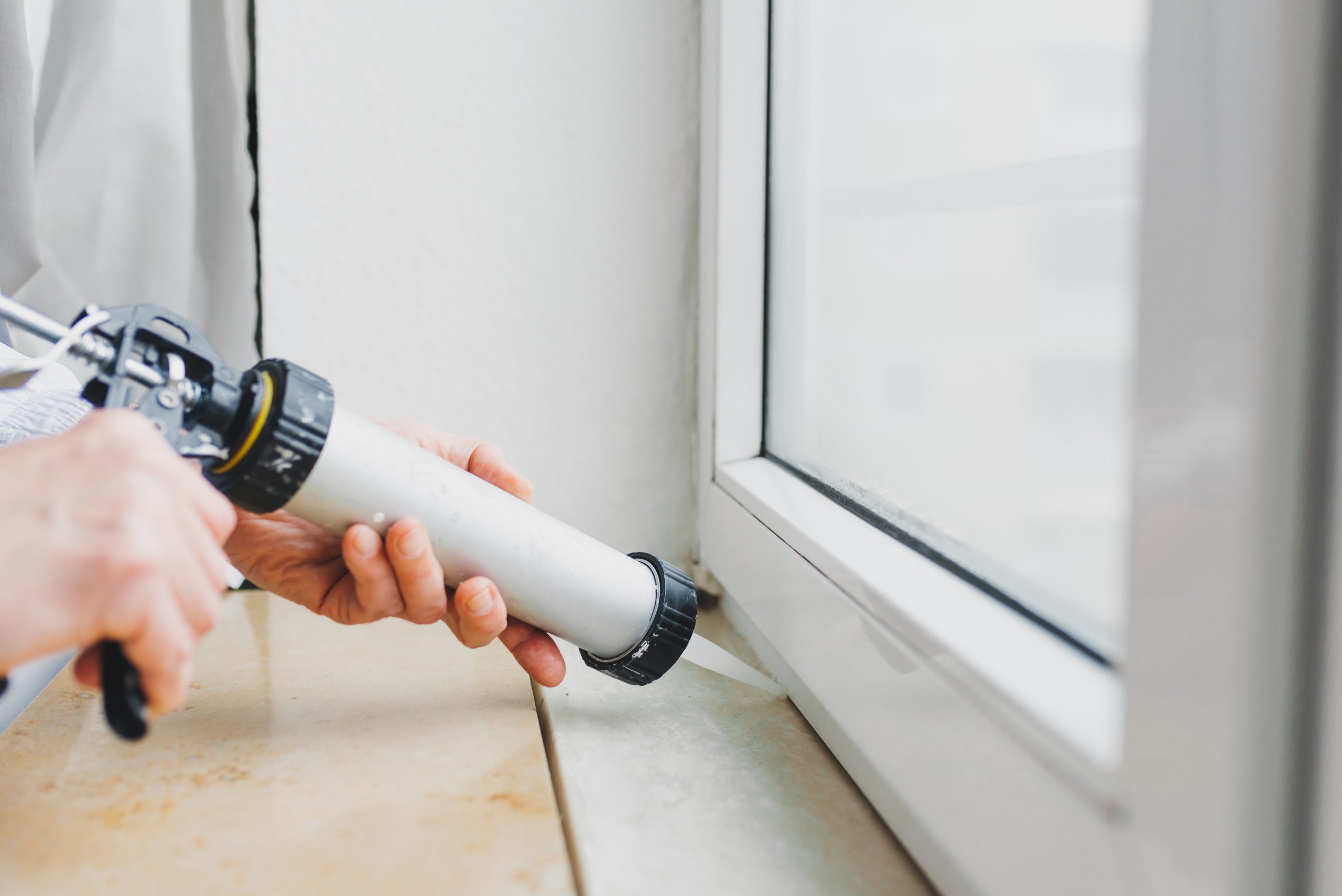 Caulking windows helps to pest proof a home